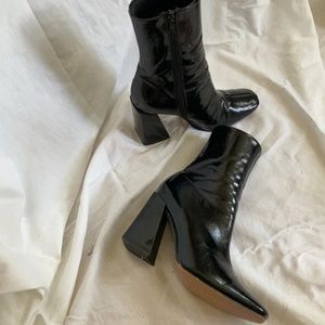 Black patent leather ankle boots